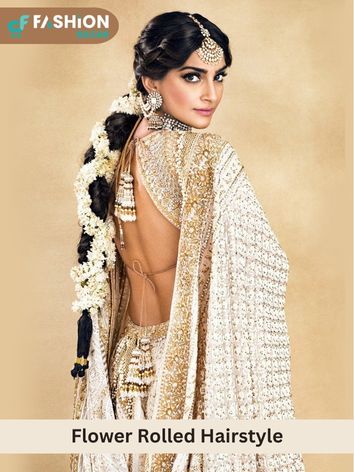 Sonam Kapoor With Flower Rolled Hairstyle in Lehenga