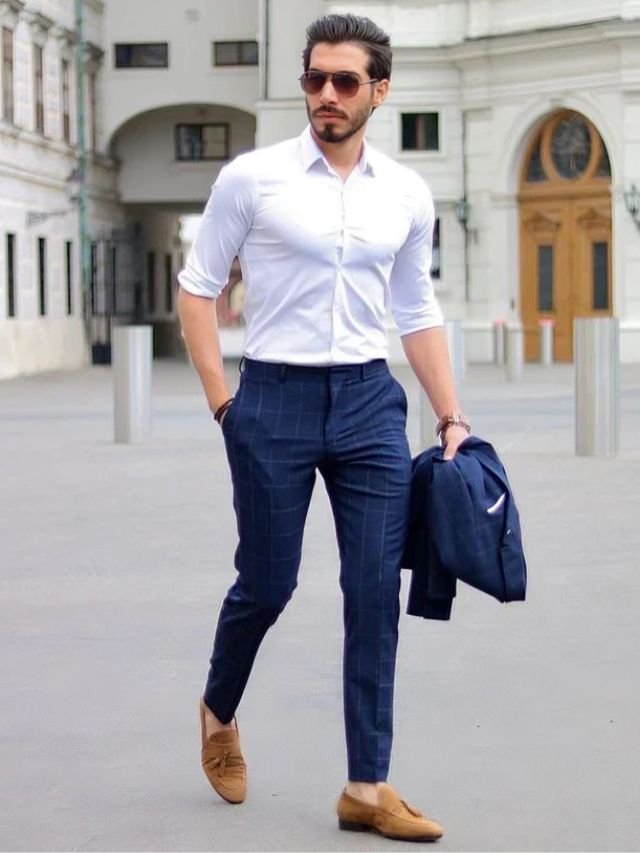A Men in Classic White Shirt with Navy Blue Trousers Combination for office