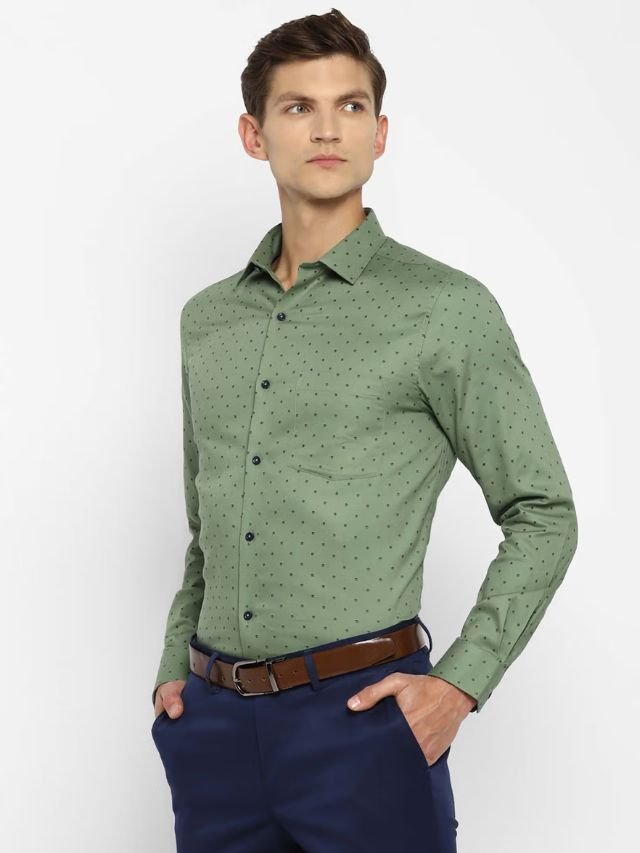 A Men in Light Green Shirt with Navy Pants for office
