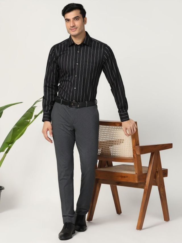 A Men in Solid Pants with Striped Shirt for office