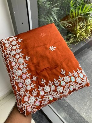 Beautiful Orange Rangoli Silk Fabric With Cutwork Border