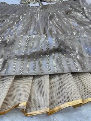 Beige Premium Butterfly Net Lehenga Choli With Heavy Embroidery
