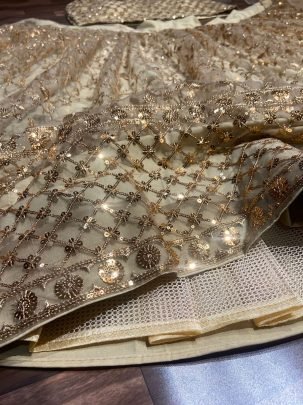 Brown Net Sequins Work Lehenga Choli With Zari Work Dupatta