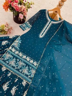 Celestial Shine Heavy Sequence Work Rama Lehenga Set
