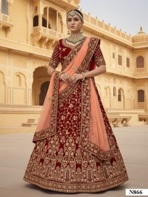 Exclusive Maroon Velvet Thread Embroidery Work Lehenga With Net Peach Dupatta