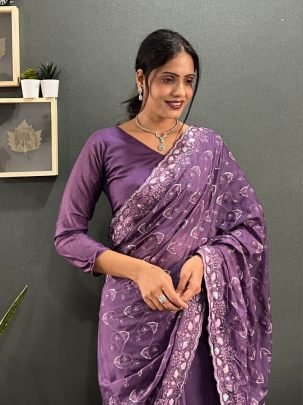 Exclusive Purple Georgette Silk Saree Paired With Matching Unstitched Blouse