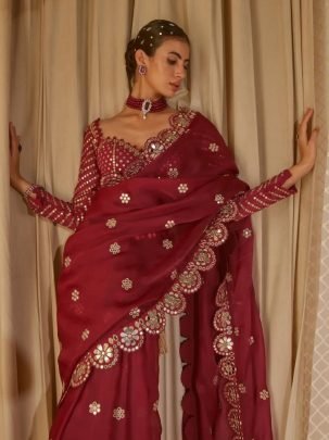 Heavy Faux Georgette Sequin Saree With Mirror Work Lace And Embroidered Stitched Blouse