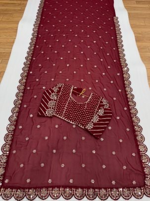 Heavy Faux Georgette Sequin Saree With Mirror Work Lace And Embroidered Stitched Blouse