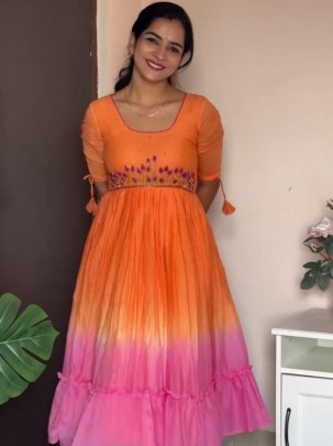 Elegant Orange Flared Dress With Pink Ruffle