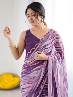 Purple Heavy Georgette Silk Printed Saree Paired With An Matching Purple Blouse