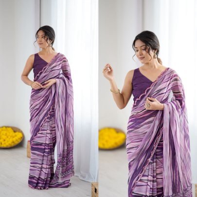 Purple Heavy Georgette Silk Printed Saree Paired With An Matching Purple Blouse