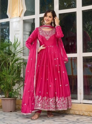 Rani Pink Festive Wear Gown With Tread Work And Sequence Work