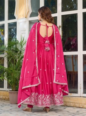 Rani Pink Festive Wear Gown With Tread Work And Sequence Work