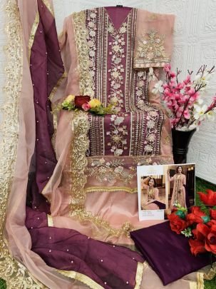 Regal Elegance Wine Pink Designer Suit with Moti   Stone Work
