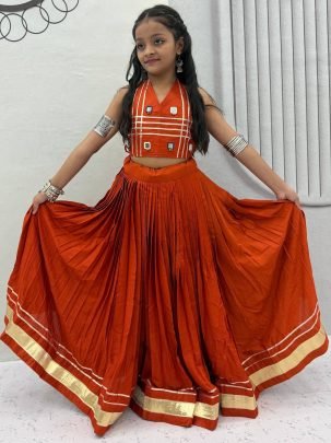 Ribbin Work Orange Colour Kids Navratri Lehenga