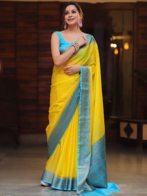 Soft Naylon Chinnon Yellow Saree With Blue Less Pallu And Running Blouse